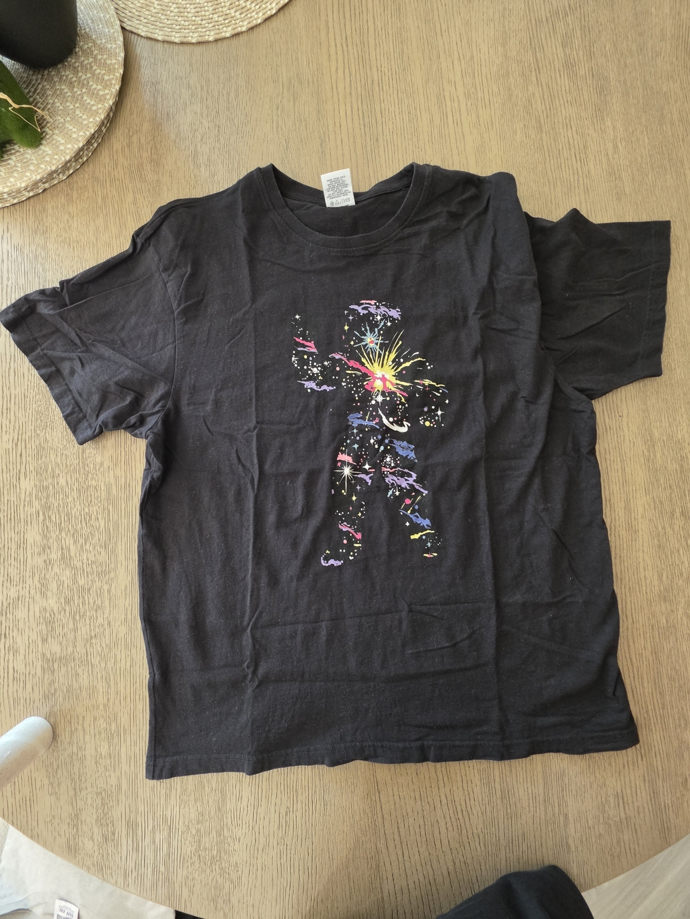 Black Graphic Tee with Colorful Firework Silhouette